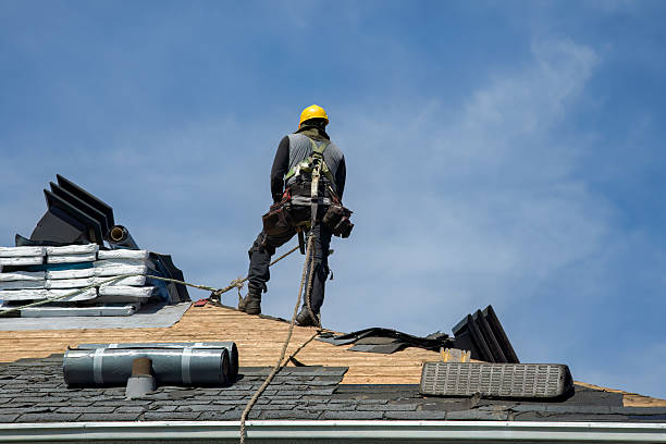 Professional Roofing technician working in Swan Lake, NY
